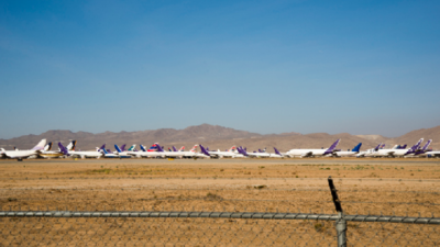 line of airplanes at airport
