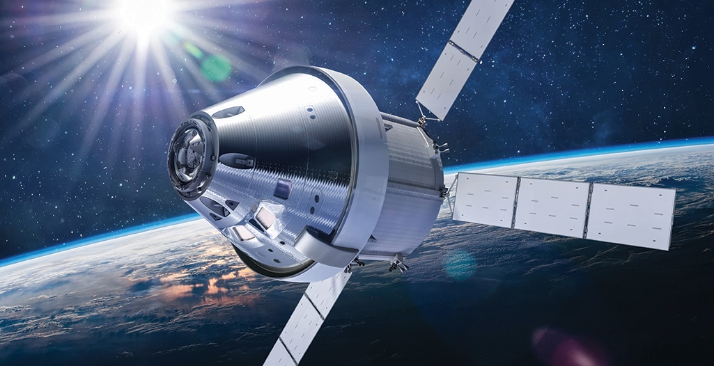 Orion spacecraft flight in space on orbit of Earth.