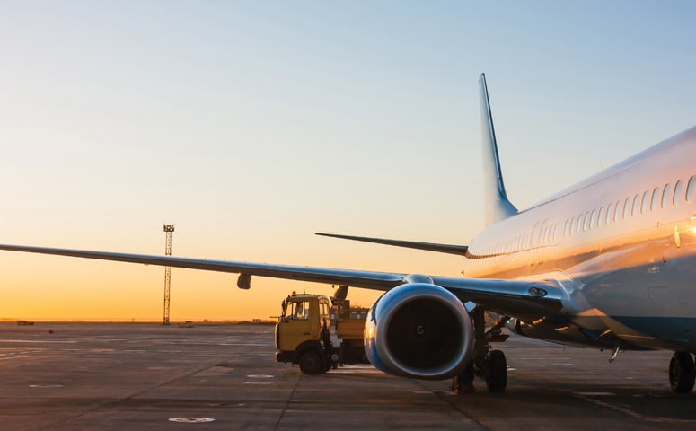 large aircraft with groundcrew