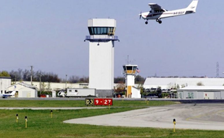 light aircraft landing at airport